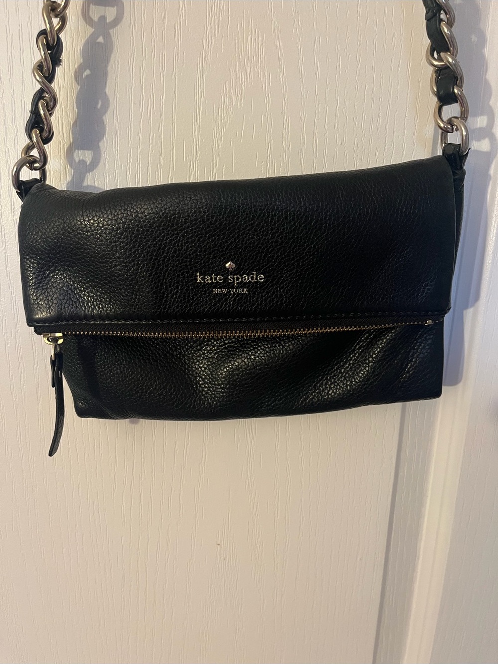 kate spade black leather fold-over crossbody with chain strap